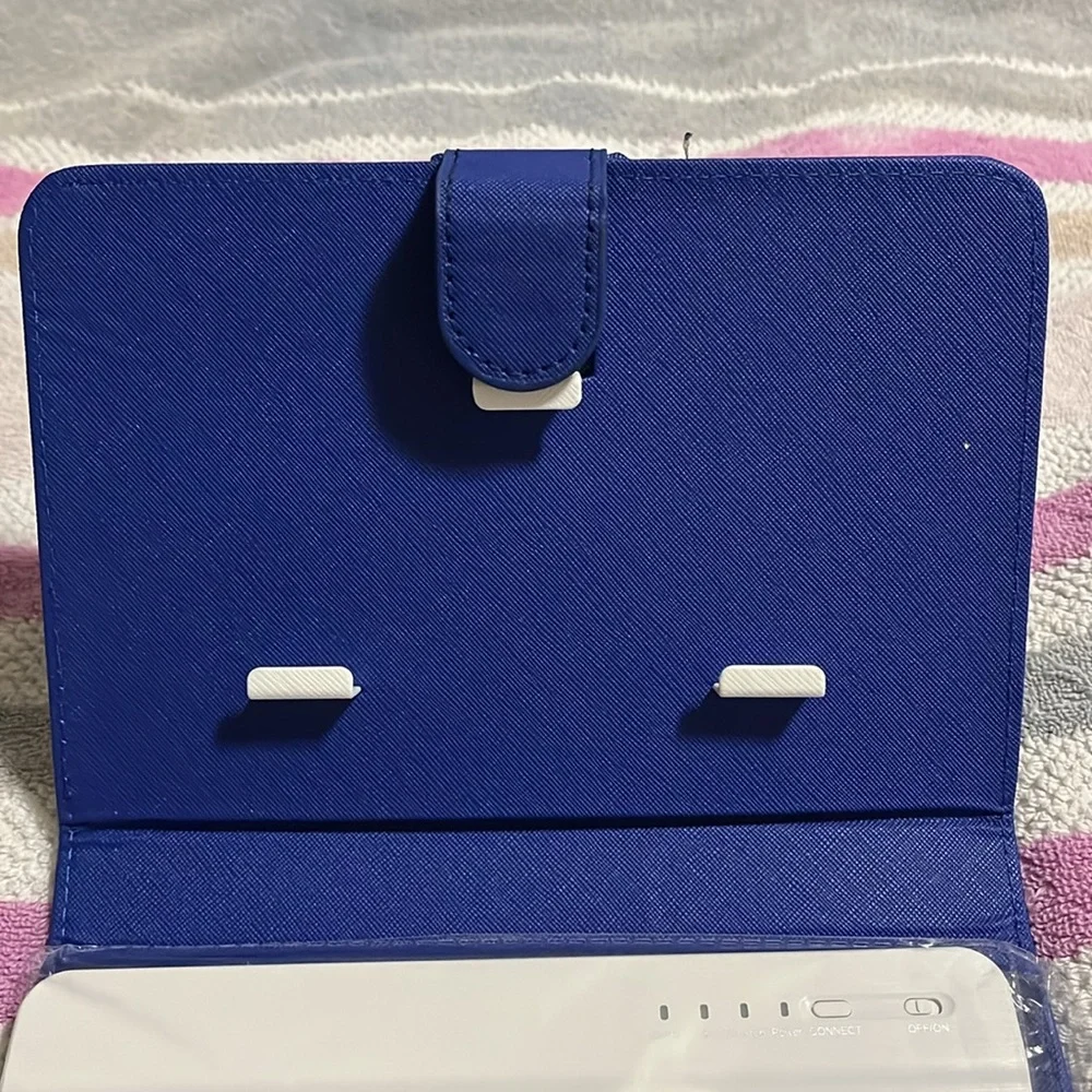 Blue tablet case with keyboard with locking mechanism for tablet